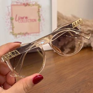 خرید آنلاین عینک آفتابی زنانه پرادا