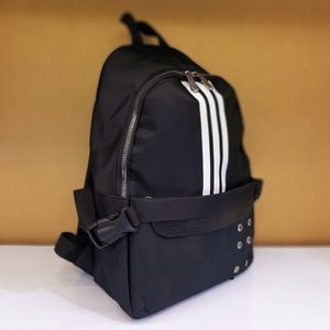 خرید اینترنتی کوله پشتی سفید مشکی