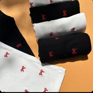 قیمت تاپ گلدوزی پاپیون سفید مشکی