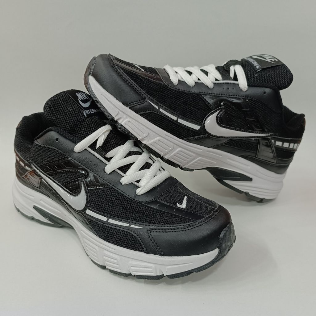 خرید آنلاین کتونی مردانه نایک اینیشیتور Nike Initiator مشکی زیره سفید کیفیت بالا