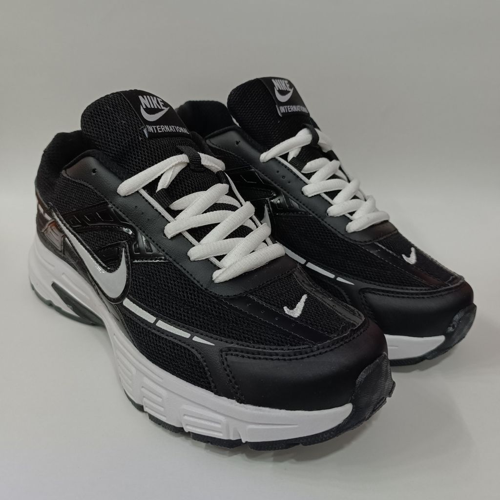 خرید انلاین کتونی مردانه نایک اینیشیتور Nike Initiator مشکی زیره سفید کیفیت بالا