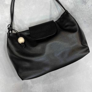 کیف رودوشی دخترانه و زنانه آویز مهره دار شل شرانگ