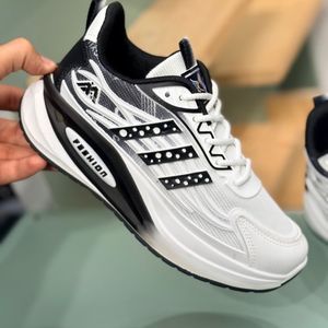 خرید اینترنتی قیمت کتونی بچگانه طرح سه خط فشن از K-Z کد 4070802