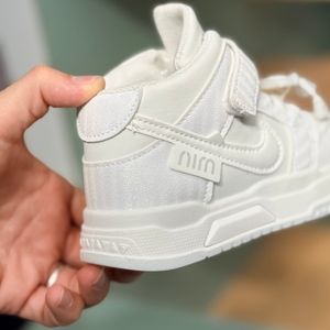 خرید اینترنتی قیمت کتونی نیمساق طرح جردن کرومی لنگ دراز برند کیدز کد 4071902