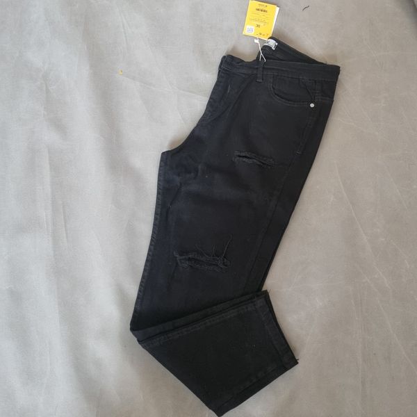 شلوار جین زنانه مشکی زاپ دار وارداتی سایز 30 تا 34 قد 94 سانتی متر