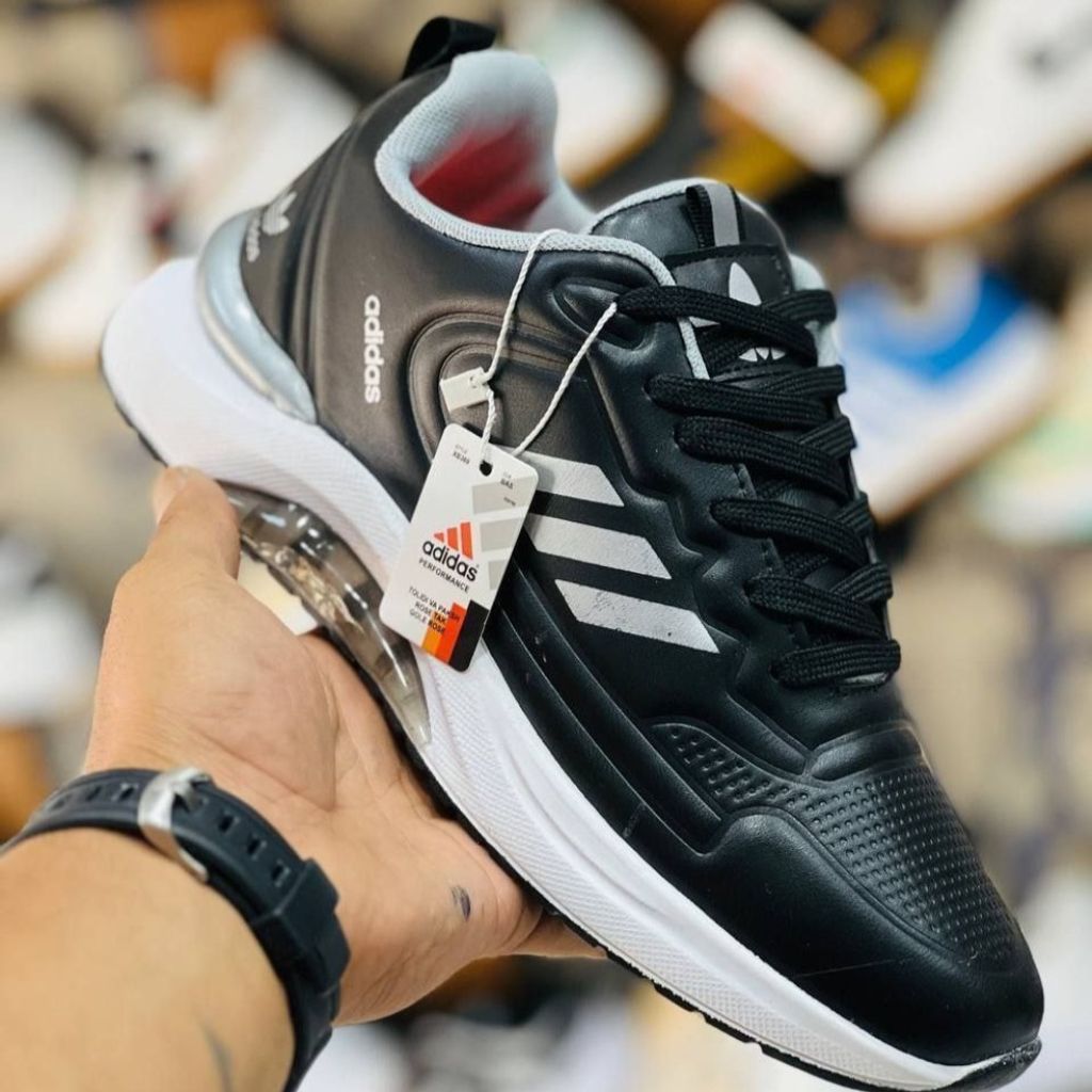 خرید انلاین کفش ادیداس کپسولی سه خط