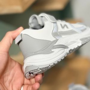 خرید اینترنتی قیمت کتونی بچگانه طرح نیوبالانس چسبی از توباکو کد 4071305