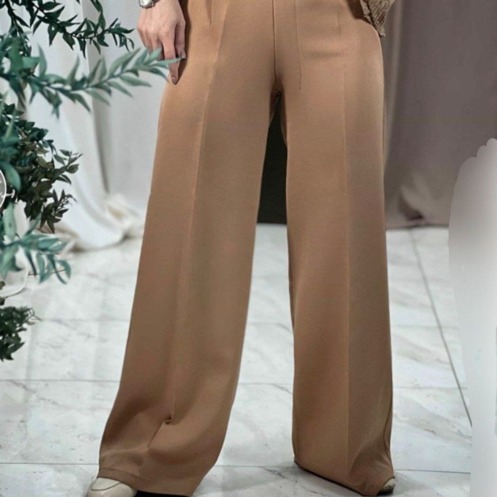 قیمت ارزان پشت کمر شلوار کش دارد