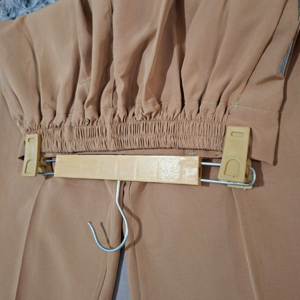 خرید انلاین پشت کمر شلوار کش دارد