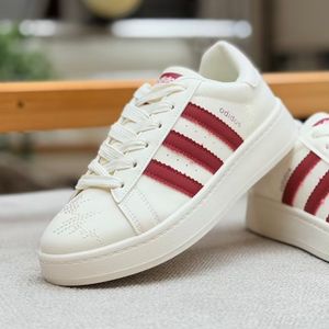 خرید اینترنتی قیمت ونس بچگانه طرح سه خط آدیداس از کاشوز کد 4092202