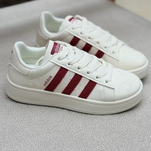 خرید اینترنتی قیمت ونس بچگانه طرح سه خط آدیداس از کاشوز کد 4092202