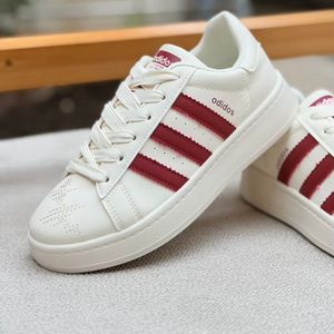 خرید اینترنتی قیمت ونس بچگانه طرح سه خط آدیداس از کاشوز کد 4092202