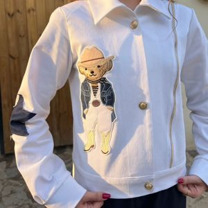 فروش اینترنتی کت جین سفید با یک گلدوزی کابوی مناسب