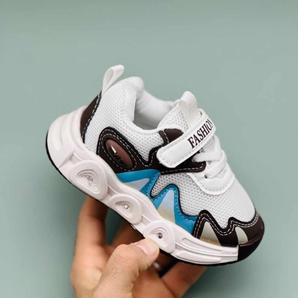 خرید اینترنتی قیمت کتونی وارداتی بچگانه طرح Fila برند Kids کد 121503