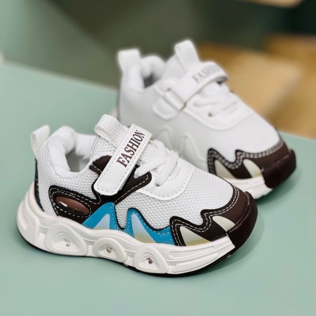 خرید اینترنتی قیمت کتونی وارداتی بچگانه طرح Fila برند Kids کد 121503