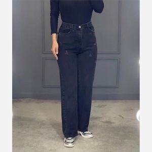 شلوار جین نیم بگ پشت کش