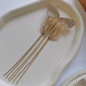 خرید اینترنتی قیمت گیره فرانسوی مجلسی فلزی پاپیون آویزدار