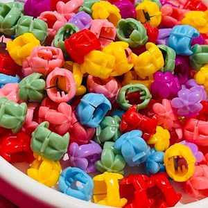 قیمت ارزان مهره مو طرح گل محصول وارداتی (بسته 50 عددی)