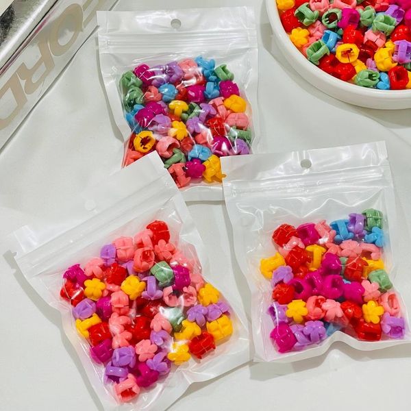 مهره مو طرح گل محصول وارداتی (بسته 50 عددی)