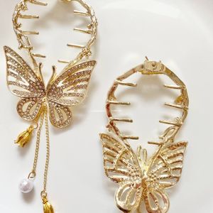 فروش اینترنتی گیره گوجه ای مجلسی فلزی پروانه ای