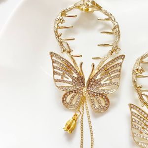 خرید آنلاین گیره گوجه ای مجلسی فلزی پروانه ای