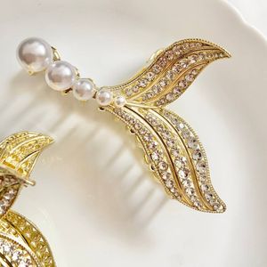 خرید اینترنتی قیمت کلیپس مجلسی فلزی دم ماهی