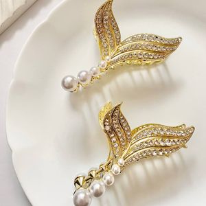 خرید اینترنتی قیمت کلیپس مجلسی فلزی دم ماهی