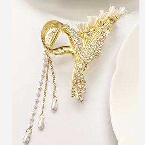 خرید اینترنتی قیمت کلیپس مجلسی خوشه گل آویزدار