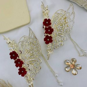 خرید اینترنتی قیمت کلیپس مجلسی فلزی رز قرمز آویزدار