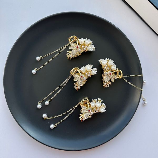 کلیپس مجلسی فلزی گل وخرگوش آویزدار