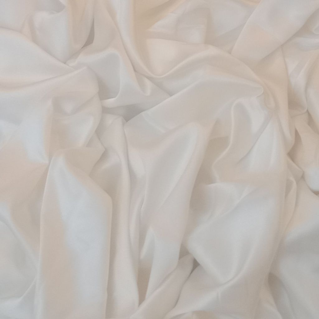 فروش اینترنتی پارچه لباس عرض 2.90 متر مدل ساتن ساده کد 021 رنگ شیری