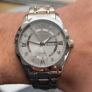 قیمت ساعت مردانه فلزی شیشه تراش مارک