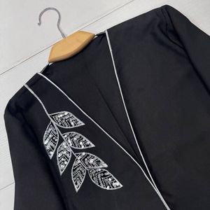 فروش اینترنتی مانتو مجلسی پولک دوزی