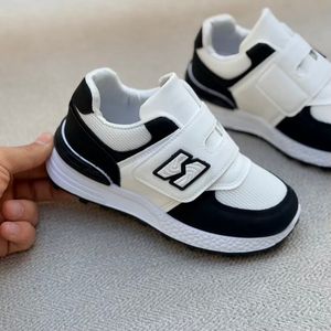 خرید اینترنتی قیمت کتونی بچگونه طرح N چسبی از کاشوز کد 4102201