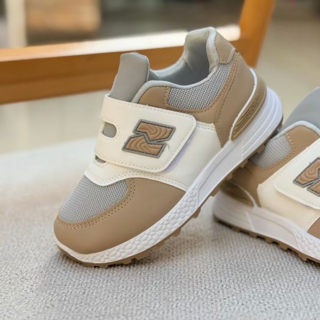 خرید اینترنتی قیمت کتونی بچگونه طرح N چسبی از کاشوز کد 4102201