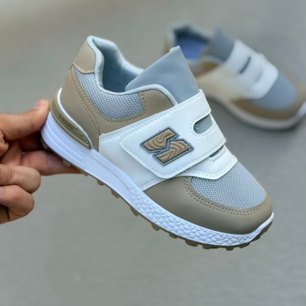 خرید اینترنتی قیمت کتونی بچگونه طرح N چسبی از کاشوز کد 4102201