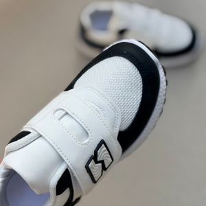 خرید اینترنتی قیمت کتونی بچگونه طرح N چسبی از کاشوز کد 4102201