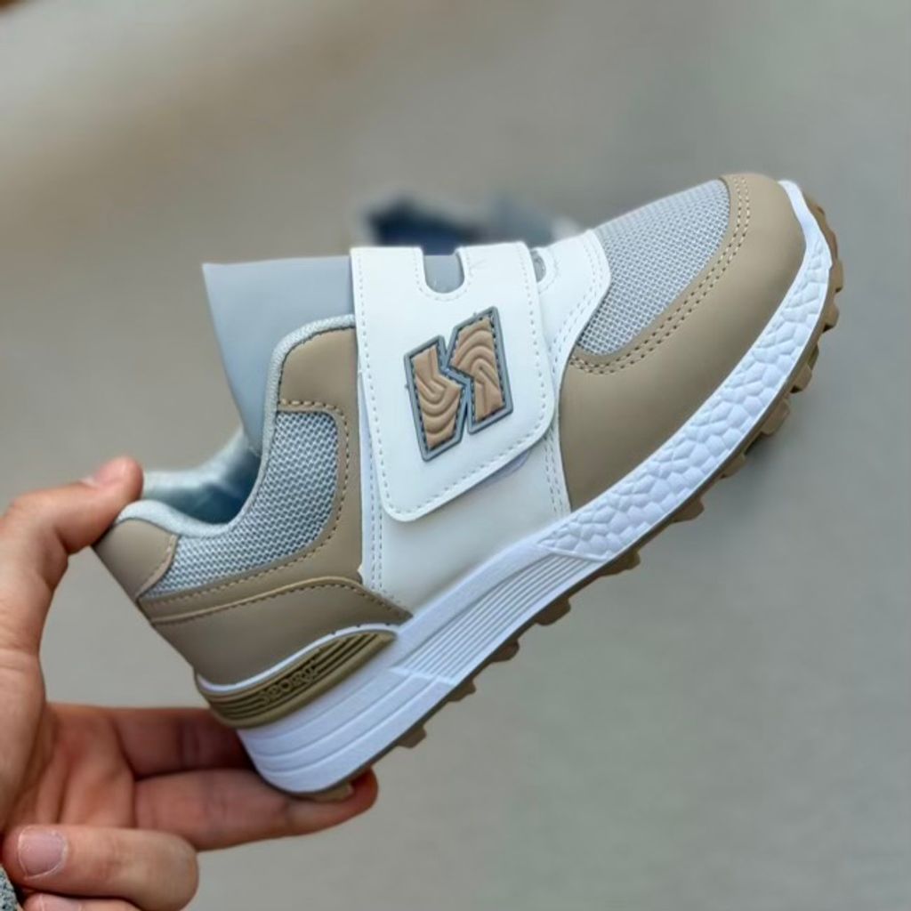 خرید اینترنتی قیمت کتونی بچگونه طرح N چسبی از کاشوز کد 4102201