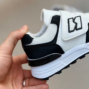 خرید اینترنتی قیمت کتونی بچگونه طرح N چسبی از کاشوز کد 4102201