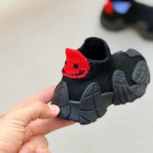 خرید اینترنتی قیمت کتونی بچگانه جورابی طرح ونوم لبخند از کاشوز کد 4102306