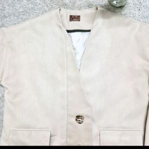 فروش اینترنتی پالتو کوتاه کرم زنانه آستردار