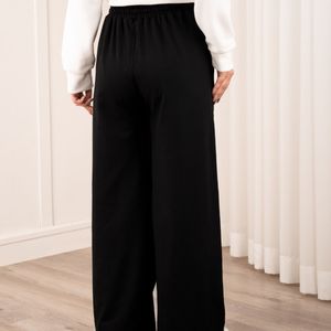 فروش اینترنتی شلوار بگ مشکی دو خط پاد