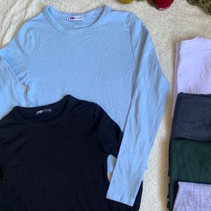 خرید انلاین بلوزبیسیک یقه گرد استین بلند