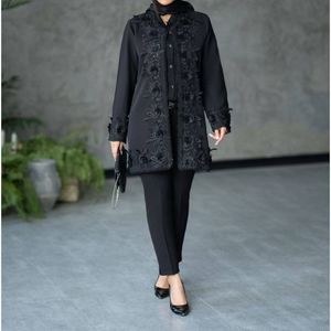 فروش اینترنتی مانتو مجلسی مزونی گل برجسته