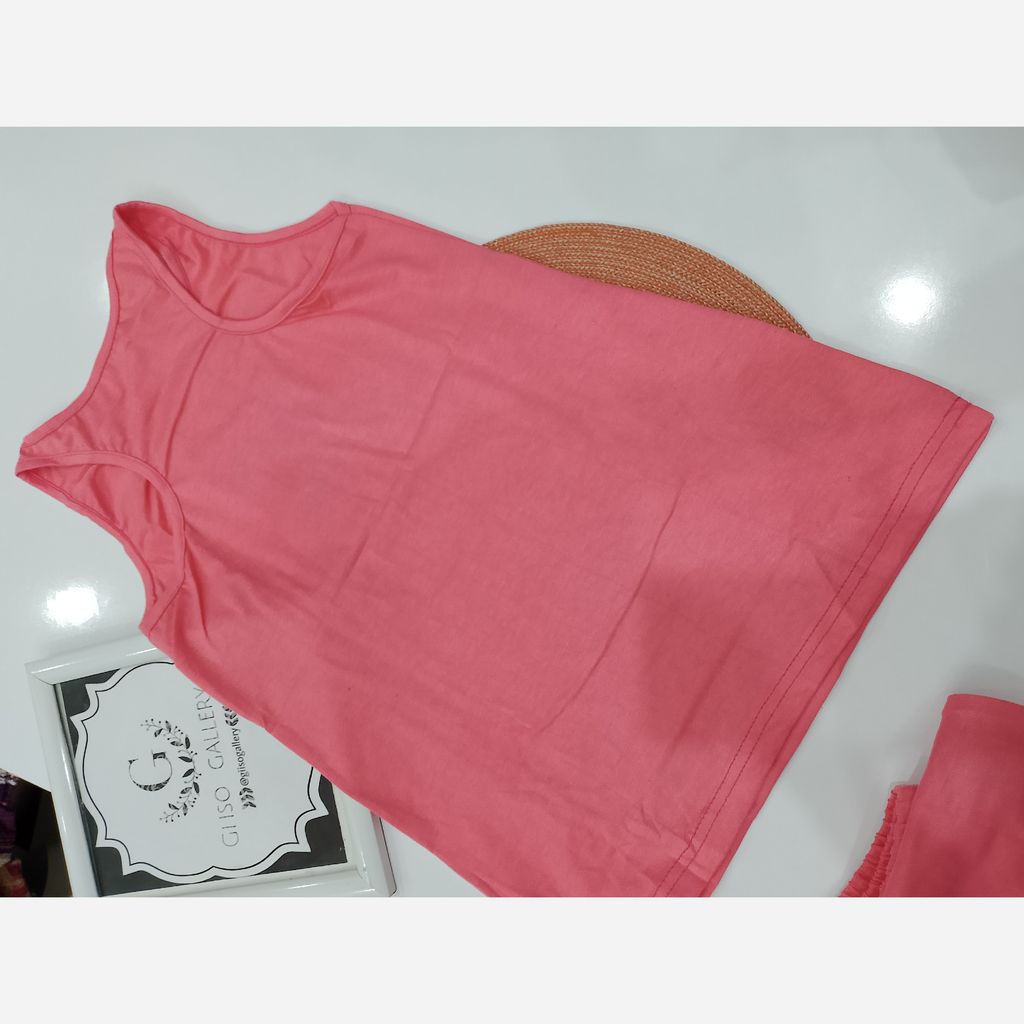 خرید اینترنتی ست تاپ و شلوارک اسپورت زنانه رنگبندی و سایزبندی