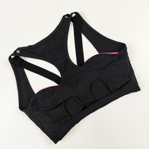 قیمت نیمتنه ورزشی آچیلا