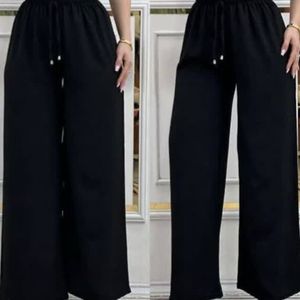 شلوار ویسکوز منگوله دار سایزبزرگ زنانه shl3i