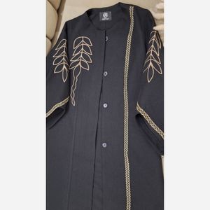 فروش اینترنتی مانتو مجلسی گلدوزی رویسا تا سایز 58 مشکی شانتون