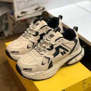 خرید اینترنتی کفش نیوبالانس لژدار 990 رنگ کرم مشکی 