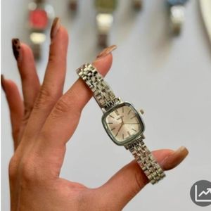 ساعت مچی زنانه نایدو مدل شیشه تراش رنگ سفید